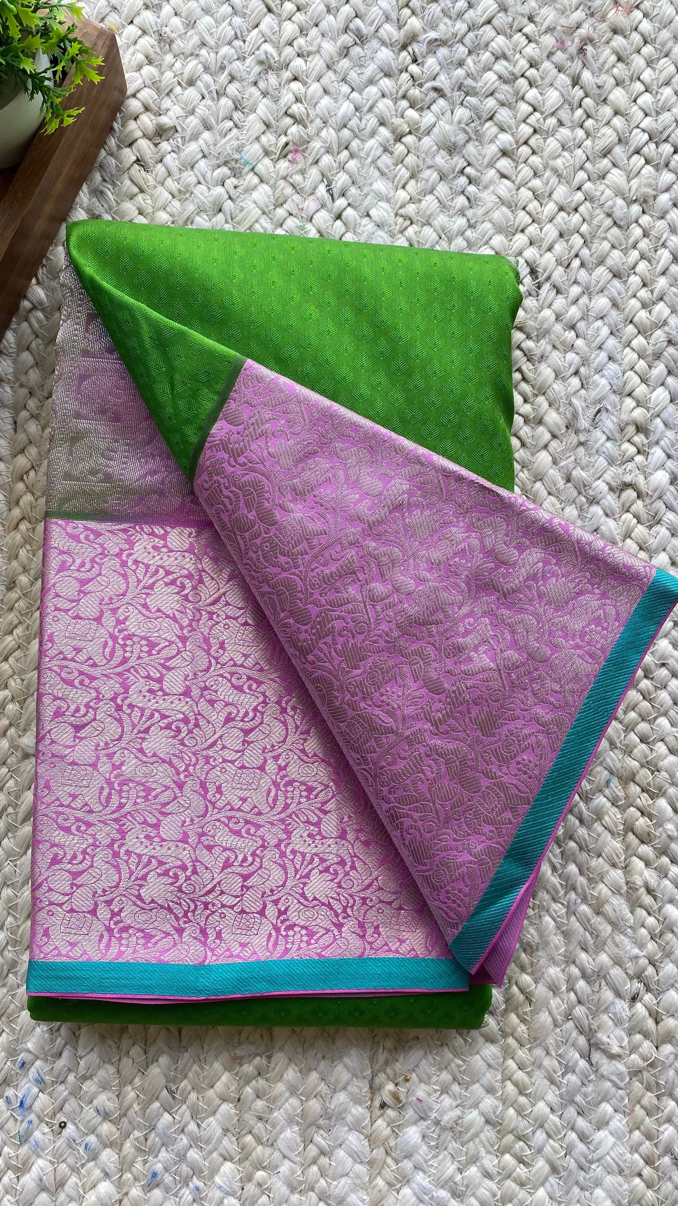 Green and pink kanchipuram silk saree with blouse
