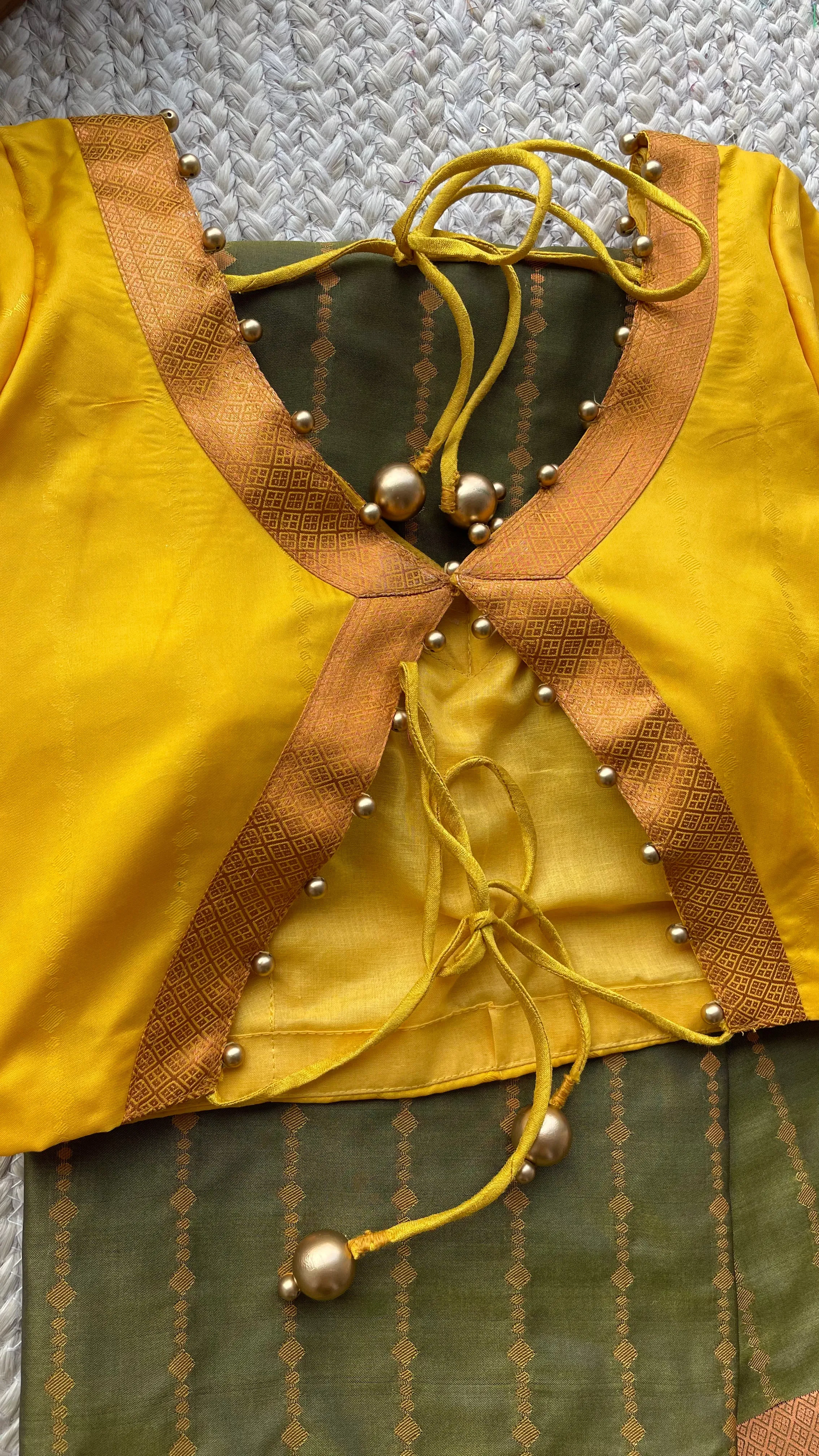Green and yellow casual silk saree with hand worked blouse